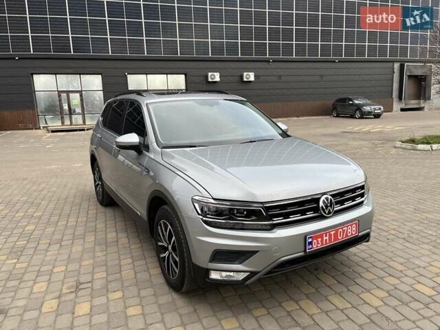 Серый Фольксваген Тигуан, объемом двигателя 2 л и пробегом 119 тыс. км за 19500 $, фото 17 на Automoto.ua