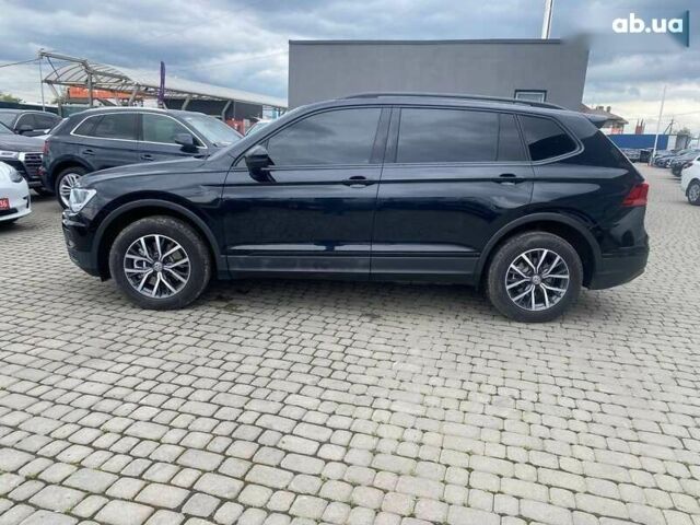 Сірий Фольксваген Тігуан, об'ємом двигуна 2 л та пробігом 131 тис. км за 19500 $, фото 3 на Automoto.ua