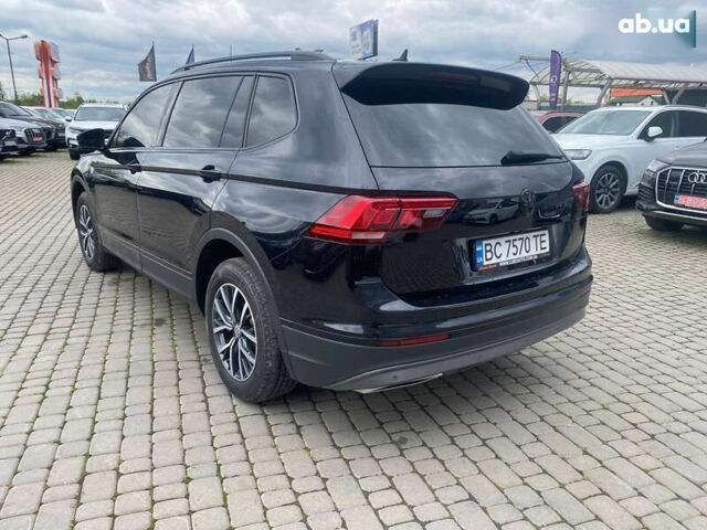 Сірий Фольксваген Тігуан, об'ємом двигуна 2 л та пробігом 131 тис. км за 19500 $, фото 4 на Automoto.ua