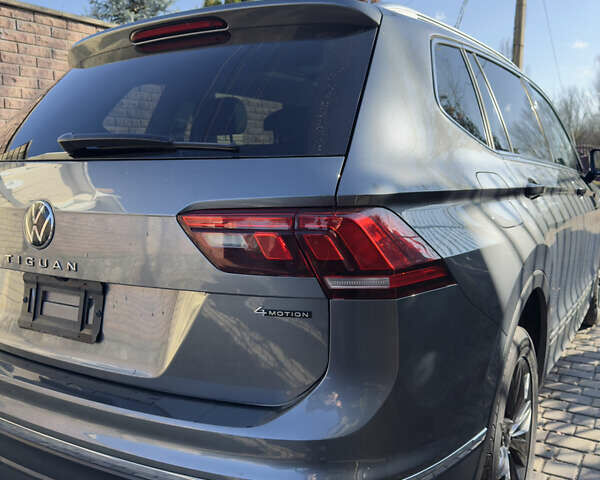 Сірий Фольксваген Тігуан, об'ємом двигуна 2 л та пробігом 97 тис. км за 24300 $, фото 5 на Automoto.ua