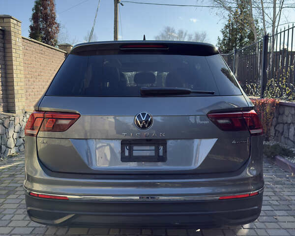 Сірий Фольксваген Тігуан, об'ємом двигуна 2 л та пробігом 97 тис. км за 24300 $, фото 4 на Automoto.ua