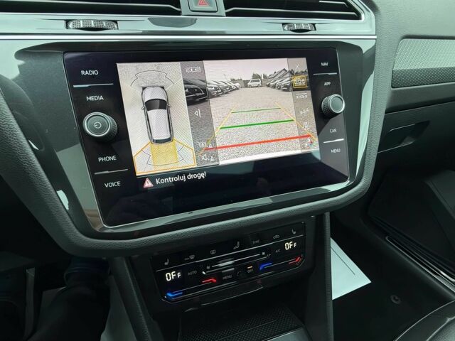 Сірий Фольксваген Тігуан, об'ємом двигуна 2 л та пробігом 24 тис. км за 14800 $, фото 11 на Automoto.ua