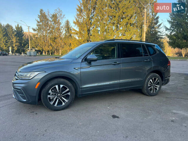 Сірий Фольксваген Тігуан, об'ємом двигуна 2 л та пробігом 77 тис. км за 19899 $, фото 1 на Automoto.ua