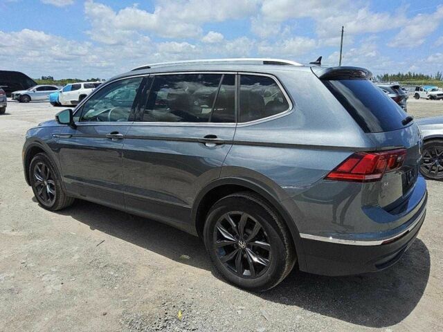 Сірий Фольксваген Тігуан, об'ємом двигуна 2 л та пробігом 60 тис. км за 7900 $, фото 2 на Automoto.ua