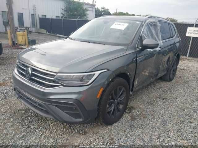 Сірий Фольксваген Тігуан, об'ємом двигуна 2 л та пробігом 37 тис. км за 12500 $, фото 1 на Automoto.ua