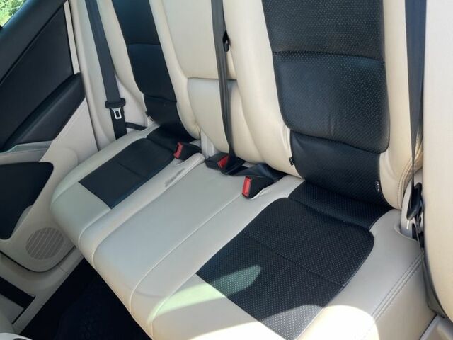 Синій Фольксваген Тігуан, об'ємом двигуна 2 л та пробігом 179 тис. км за 9800 $, фото 4 на Automoto.ua