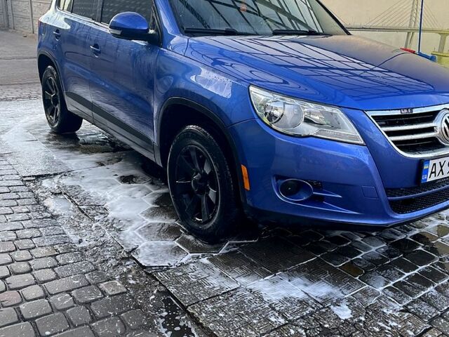 Синий Фольксваген Тигуан, объемом двигателя 2 л и пробегом 130 тыс. км за 9500 $, фото 1 на Automoto.ua