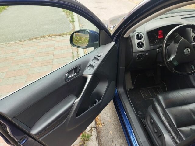 Синий Фольксваген Тигуан, объемом двигателя 2 л и пробегом 265 тыс. км за 8300 $, фото 5 на Automoto.ua