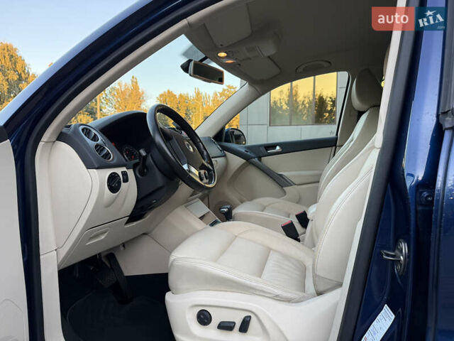 Синій Фольксваген Тігуан, об'ємом двигуна 2 л та пробігом 158 тис. км за 10999 $, фото 10 на Automoto.ua