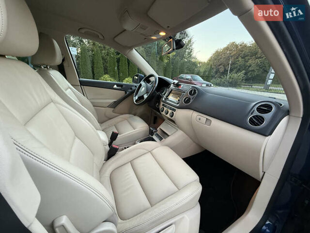 Синій Фольксваген Тігуан, об'ємом двигуна 2 л та пробігом 158 тис. км за 10999 $, фото 29 на Automoto.ua