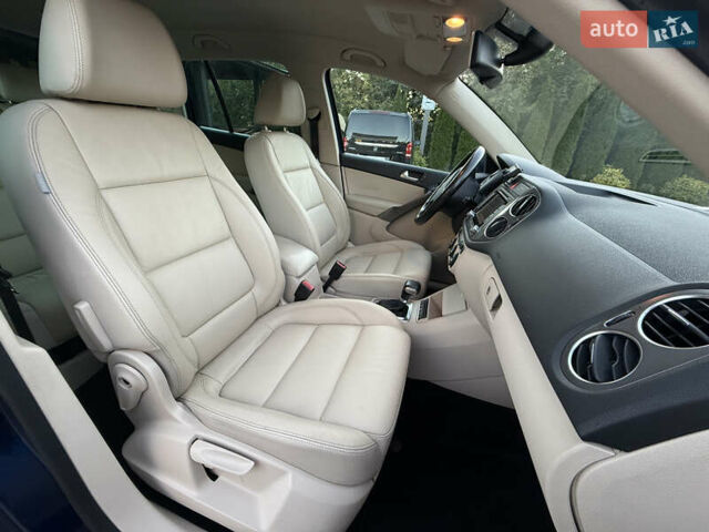 Синій Фольксваген Тігуан, об'ємом двигуна 2 л та пробігом 158 тис. км за 10999 $, фото 31 на Automoto.ua