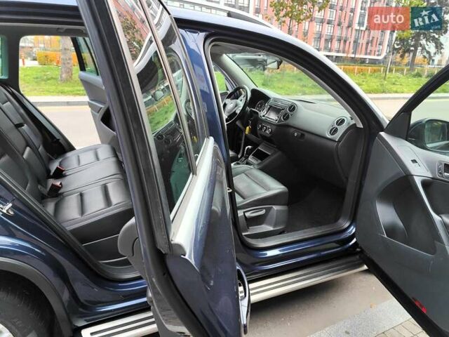 Синий Фольксваген Тигуан, объемом двигателя 2 л и пробегом 278 тыс. км за 8490 $, фото 27 на Automoto.ua