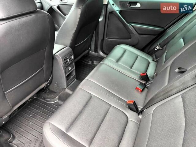 Синий Фольксваген Тигуан, объемом двигателя 2 л и пробегом 278 тыс. км за 8490 $, фото 46 на Automoto.ua