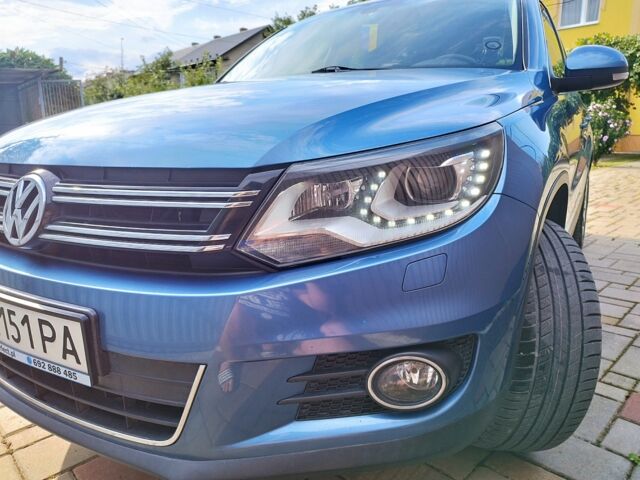 Синій Фольксваген Тігуан, об'ємом двигуна 2 л та пробігом 242 тис. км за 14600 $, фото 1 на Automoto.ua