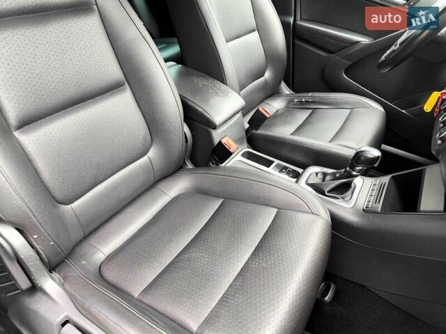 Синий Фольксваген Тигуан, объемом двигателя 2 л и пробегом 278 тыс. км за 8490 $, фото 55 на Automoto.ua