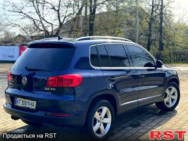 Синій Фольксваген Тігуан, об'ємом двигуна 2 л та пробігом 153 тис. км за 11800 $, фото 3 на Automoto.ua