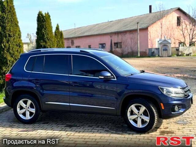 Синій Фольксваген Тігуан, об'ємом двигуна 2 л та пробігом 153 тис. км за 11800 $, фото 1 на Automoto.ua