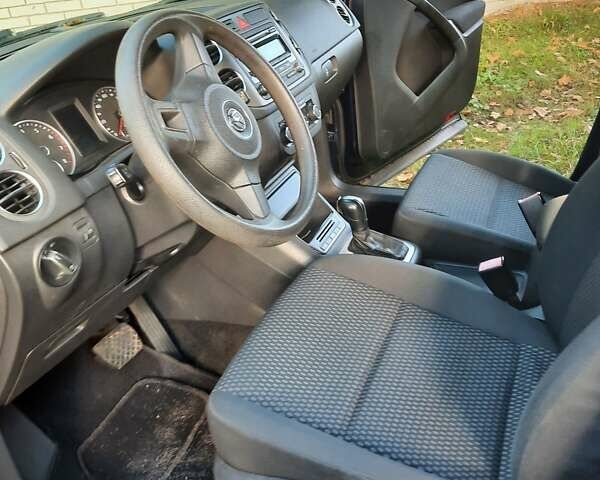 Синій Фольксваген Тігуан, об'ємом двигуна 2 л та пробігом 170 тис. км за 9500 $, фото 4 на Automoto.ua