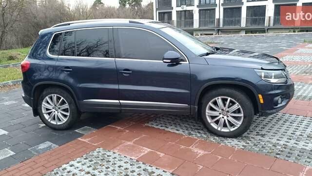 Синий Фольксваген Тигуан, объемом двигателя 2 л и пробегом 160 тыс. км за 10000 $, фото 4 на Automoto.ua