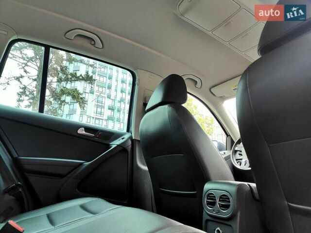 Синий Фольксваген Тигуан, объемом двигателя 2 л и пробегом 278 тыс. км за 8490 $, фото 61 на Automoto.ua