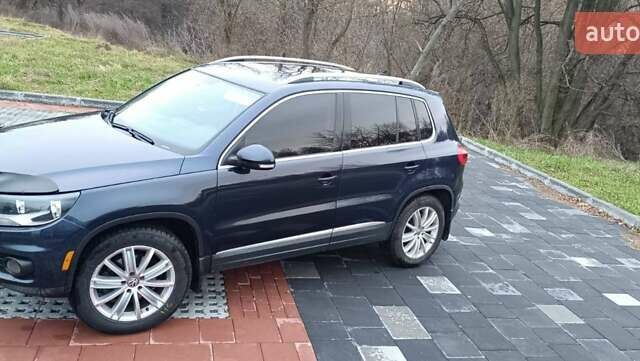 Синий Фольксваген Тигуан, объемом двигателя 2 л и пробегом 160 тыс. км за 10000 $, фото 3 на Automoto.ua