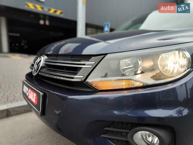 Синий Фольксваген Тигуан, объемом двигателя 2 л и пробегом 278 тыс. км за 8490 $, фото 1 на Automoto.ua