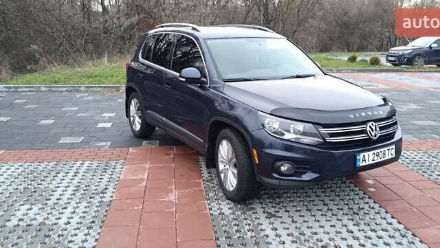 Синий Фольксваген Тигуан, объемом двигателя 2 л и пробегом 160 тыс. км за 10000 $, фото 1 на Automoto.ua