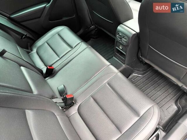 Синий Фольксваген Тигуан, объемом двигателя 2 л и пробегом 278 тыс. км за 8490 $, фото 60 на Automoto.ua