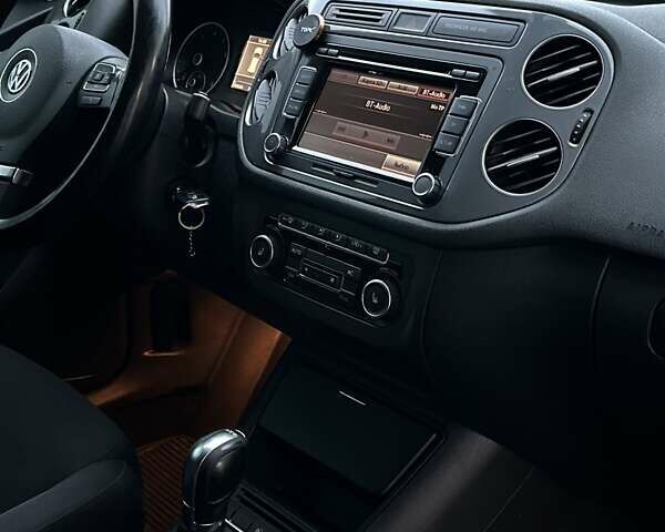 Синій Фольксваген Тігуан, об'ємом двигуна 1.98 л та пробігом 290 тис. км за 10200 $, фото 27 на Automoto.ua