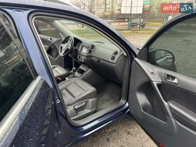 Синий Фольксваген Тигуан, объемом двигателя 1.98 л и пробегом 203 тыс. км за 12000 $, фото 24 на Automoto.ua