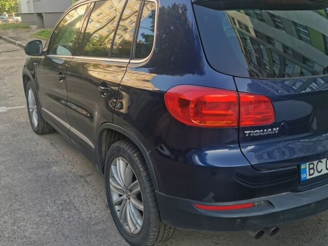 Синий Фольксваген Тигуан, объемом двигателя 2 л и пробегом 153 тыс. км за 9500 $, фото 2 на Automoto.ua