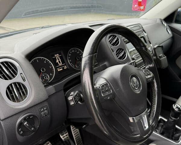 Синий Фольксваген Тигуан, объемом двигателя 1.97 л и пробегом 356 тыс. км за 12700 $, фото 37 на Automoto.ua