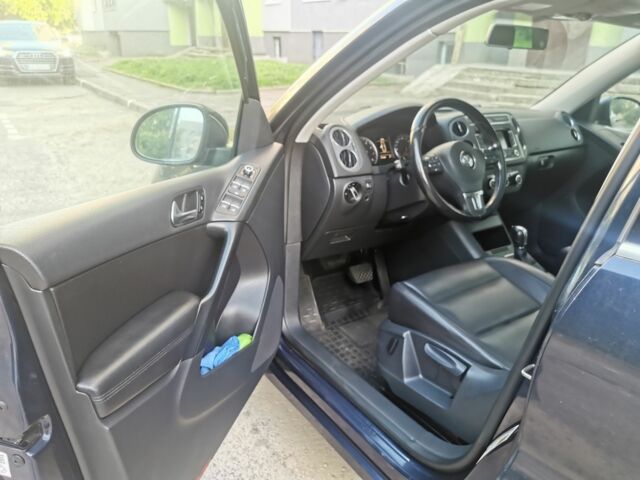 Синий Фольксваген Тигуан, объемом двигателя 2 л и пробегом 153 тыс. км за 9500 $, фото 3 на Automoto.ua