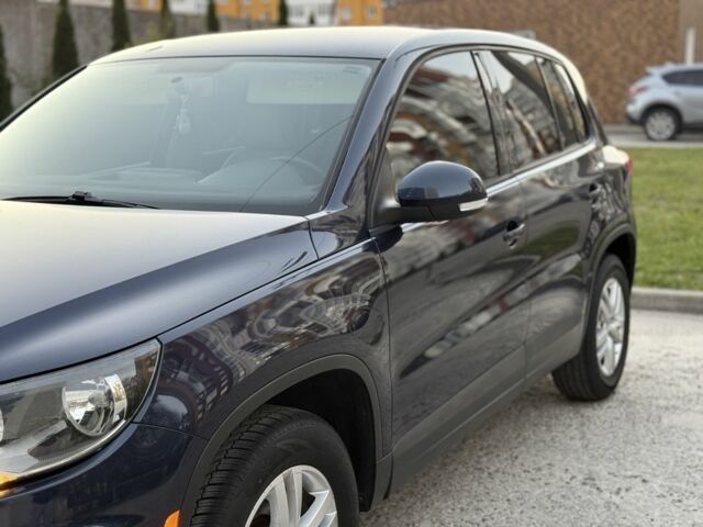 Синий Фольксваген Тигуан, объемом двигателя 2 л и пробегом 210 тыс. км за 9800 $, фото 2 на Automoto.ua