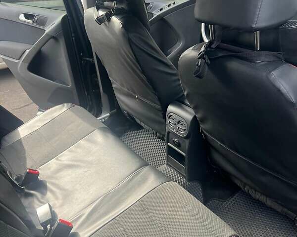 Синий Фольксваген Тигуан, объемом двигателя 1.98 л и пробегом 213 тыс. км за 10500 $, фото 6 на Automoto.ua