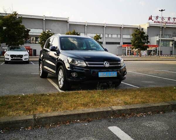 Синий Фольксваген Тигуан, объемом двигателя 1.39 л и пробегом 179 тыс. км за 11500 $, фото 3 на Automoto.ua