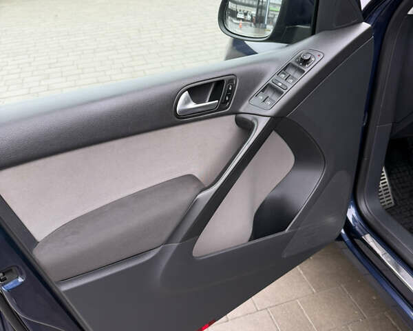 Синий Фольксваген Тигуан, объемом двигателя 1.97 л и пробегом 356 тыс. км за 12700 $, фото 34 на Automoto.ua