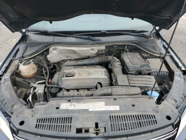 Синий Фольксваген Тигуан, объемом двигателя 2 л и пробегом 205 тыс. км за 8900 $, фото 11 на Automoto.ua