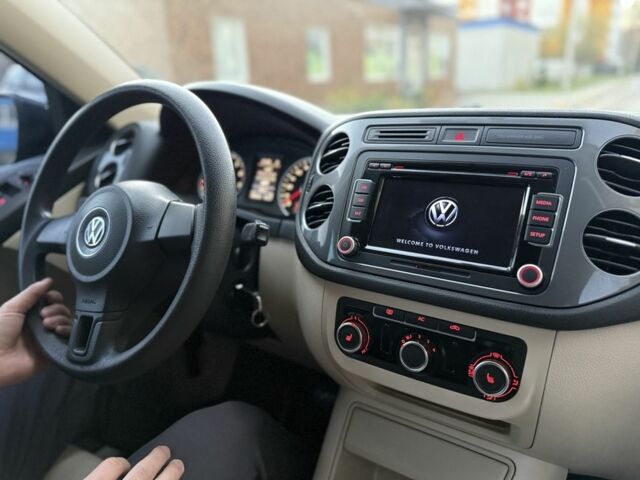 Синий Фольксваген Тигуан, объемом двигателя 2 л и пробегом 210 тыс. км за 9800 $, фото 19 на Automoto.ua