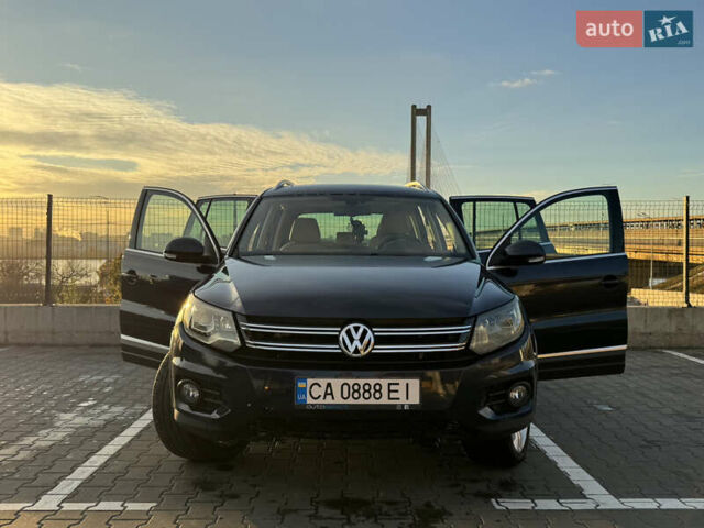 Синий Фольксваген Тигуан, объемом двигателя 2 л и пробегом 167 тыс. км за 12499 $, фото 1 на Automoto.ua