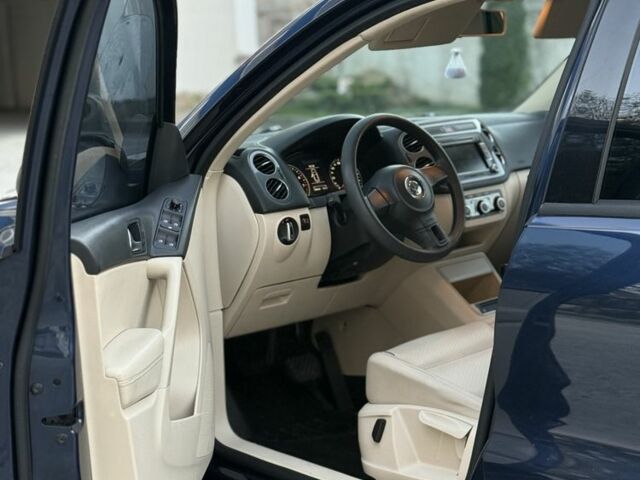 Синий Фольксваген Тигуан, объемом двигателя 2 л и пробегом 210 тыс. км за 9800 $, фото 5 на Automoto.ua