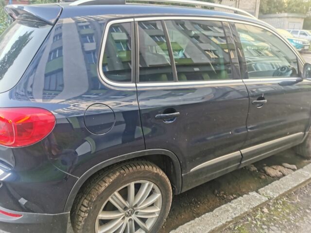 Синий Фольксваген Тигуан, объемом двигателя 2 л и пробегом 153 тыс. км за 9500 $, фото 4 на Automoto.ua