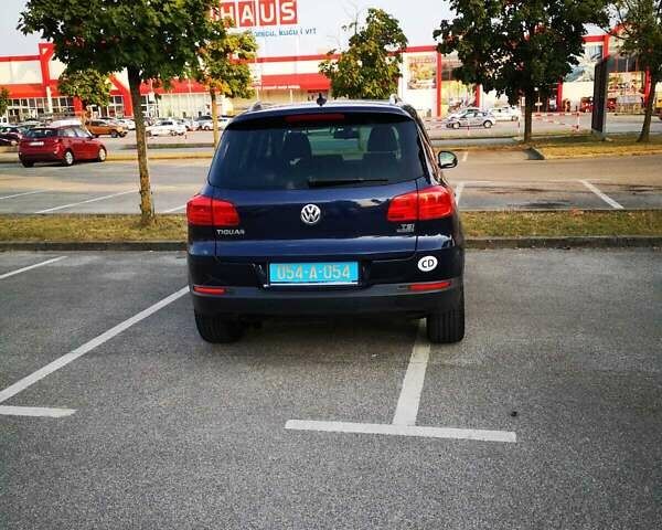 Синий Фольксваген Тигуан, объемом двигателя 1.39 л и пробегом 179 тыс. км за 11500 $, фото 2 на Automoto.ua