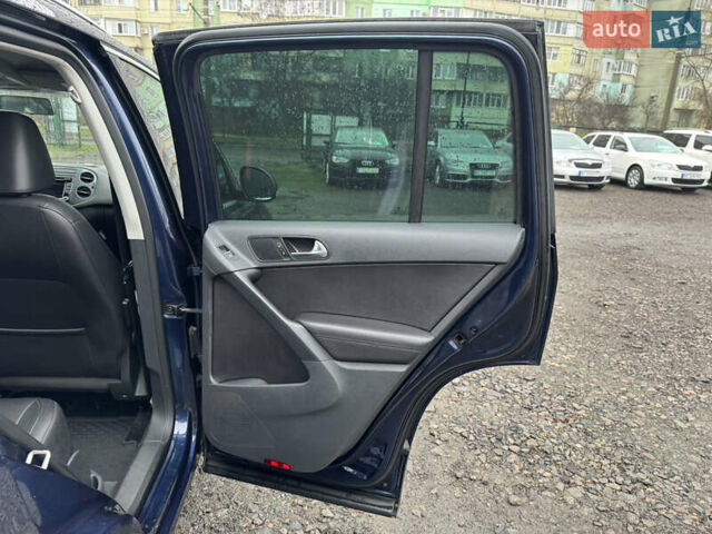 Синий Фольксваген Тигуан, объемом двигателя 1.98 л и пробегом 203 тыс. км за 12000 $, фото 20 на Automoto.ua