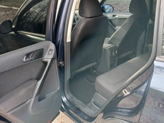 Синий Фольксваген Тигуан, объемом двигателя 2 л и пробегом 200 тыс. км за 11500 $, фото 5 на Automoto.ua