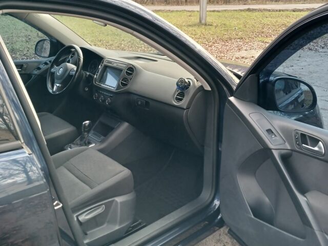 Синий Фольксваген Тигуан, объемом двигателя 2 л и пробегом 200 тыс. км за 11500 $, фото 6 на Automoto.ua