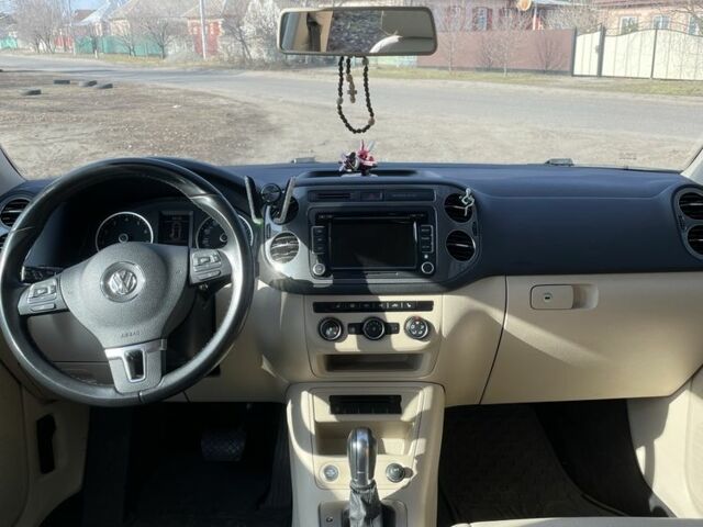 Синий Фольксваген Тигуан, объемом двигателя 2 л и пробегом 203 тыс. км за 13700 $, фото 4 на Automoto.ua