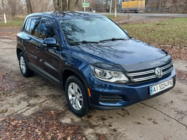 Синий Фольксваген Тигуан, объемом двигателя 2 л и пробегом 200 тыс. км за 11500 $, фото 1 на Automoto.ua