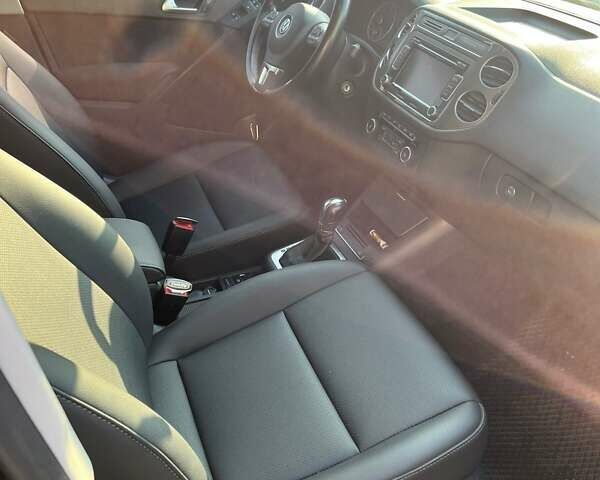 Синий Фольксваген Тигуан, объемом двигателя 1.97 л и пробегом 155 тыс. км за 16500 $, фото 3 на Automoto.ua