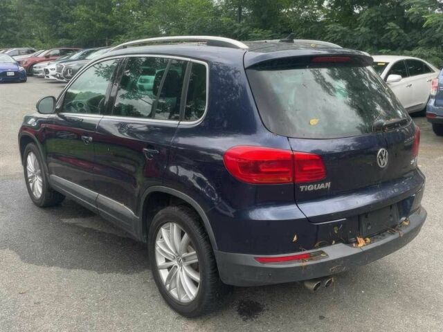 Синий Фольксваген Тигуан, объемом двигателя 2 л и пробегом 83 тыс. км за 2100 $, фото 3 на Automoto.ua